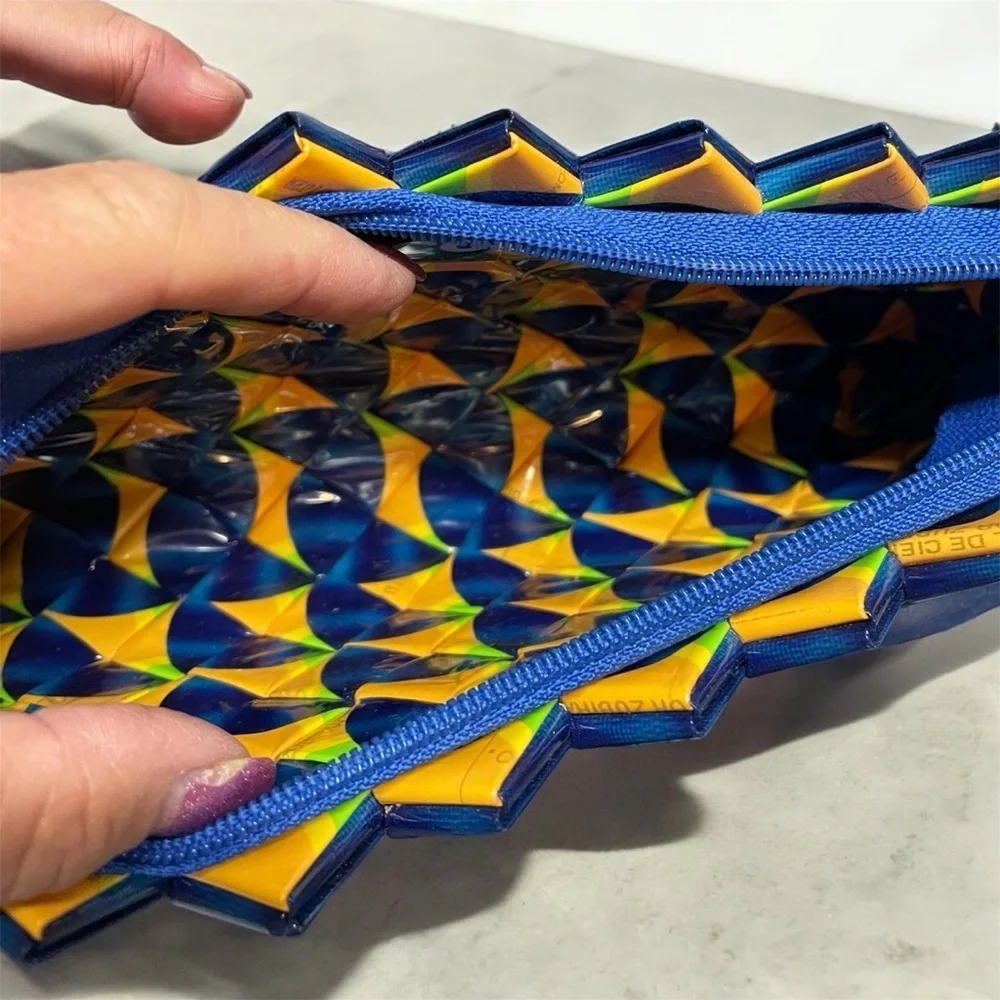 Ecoist wristlet, iridescent blue, braided, zipper closure